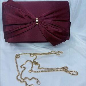 Elegant Burgundy Clutch with Gold Chain
